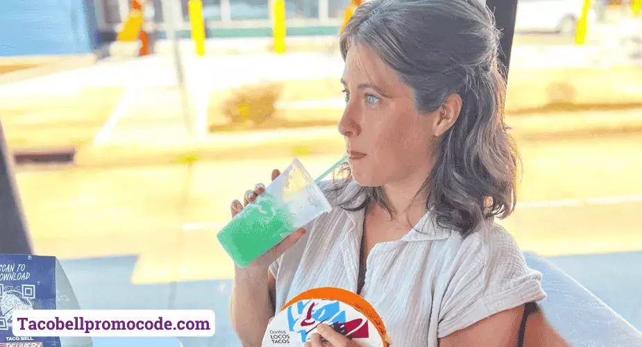 A women enjoying Taco Bell drinks during Happy Hour using a promo code